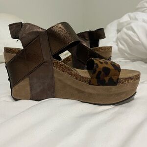 Pierre Dumas Women’s size 7 cheetah print and glittery brown wedge heel.